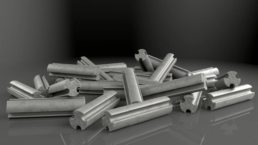 Scattered metallic cylindrical catalyst pellets with cross-shaped profiles on a dark reflective surface
